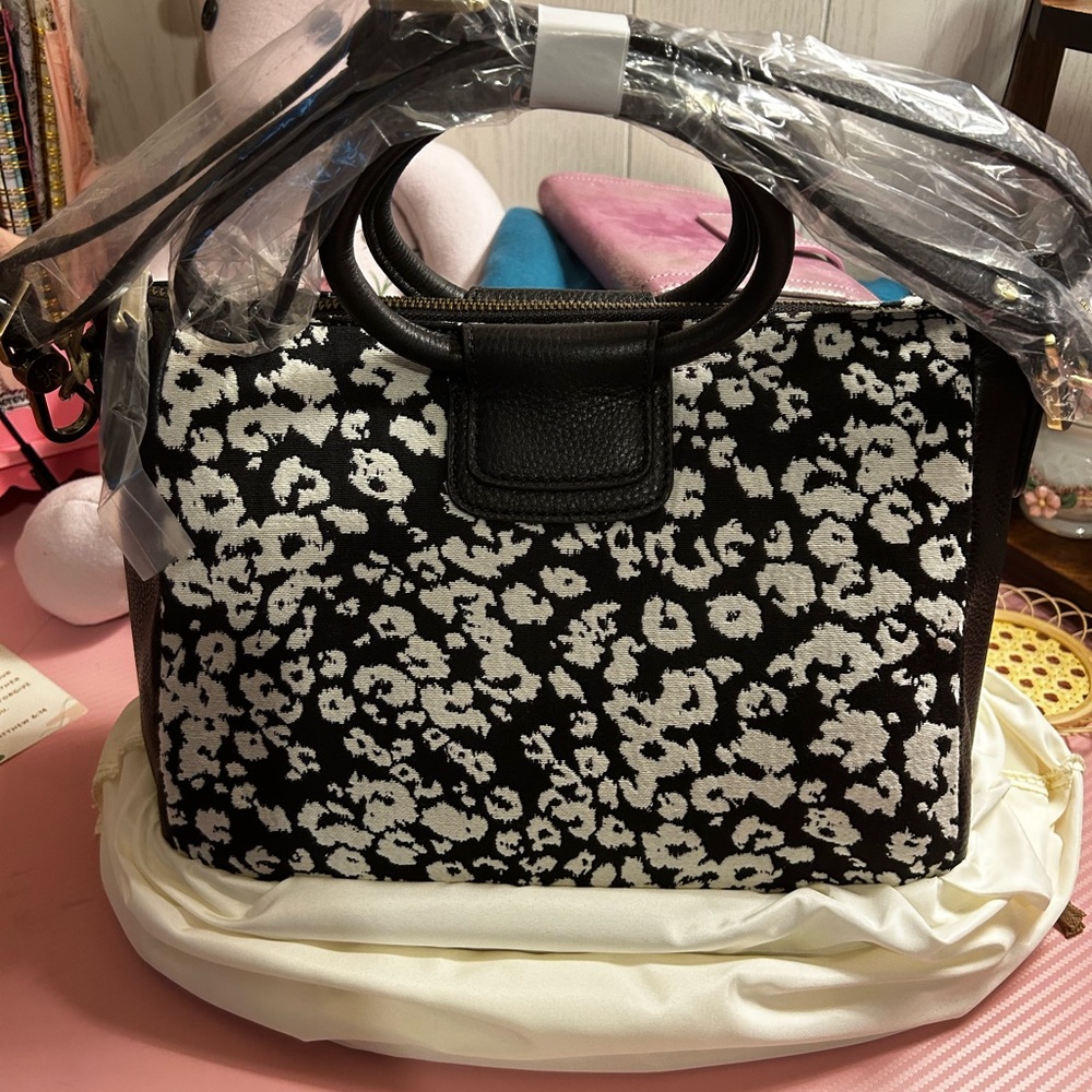 Brand new HOBO Sheila medium leopard black and white bag w/crossbody strap